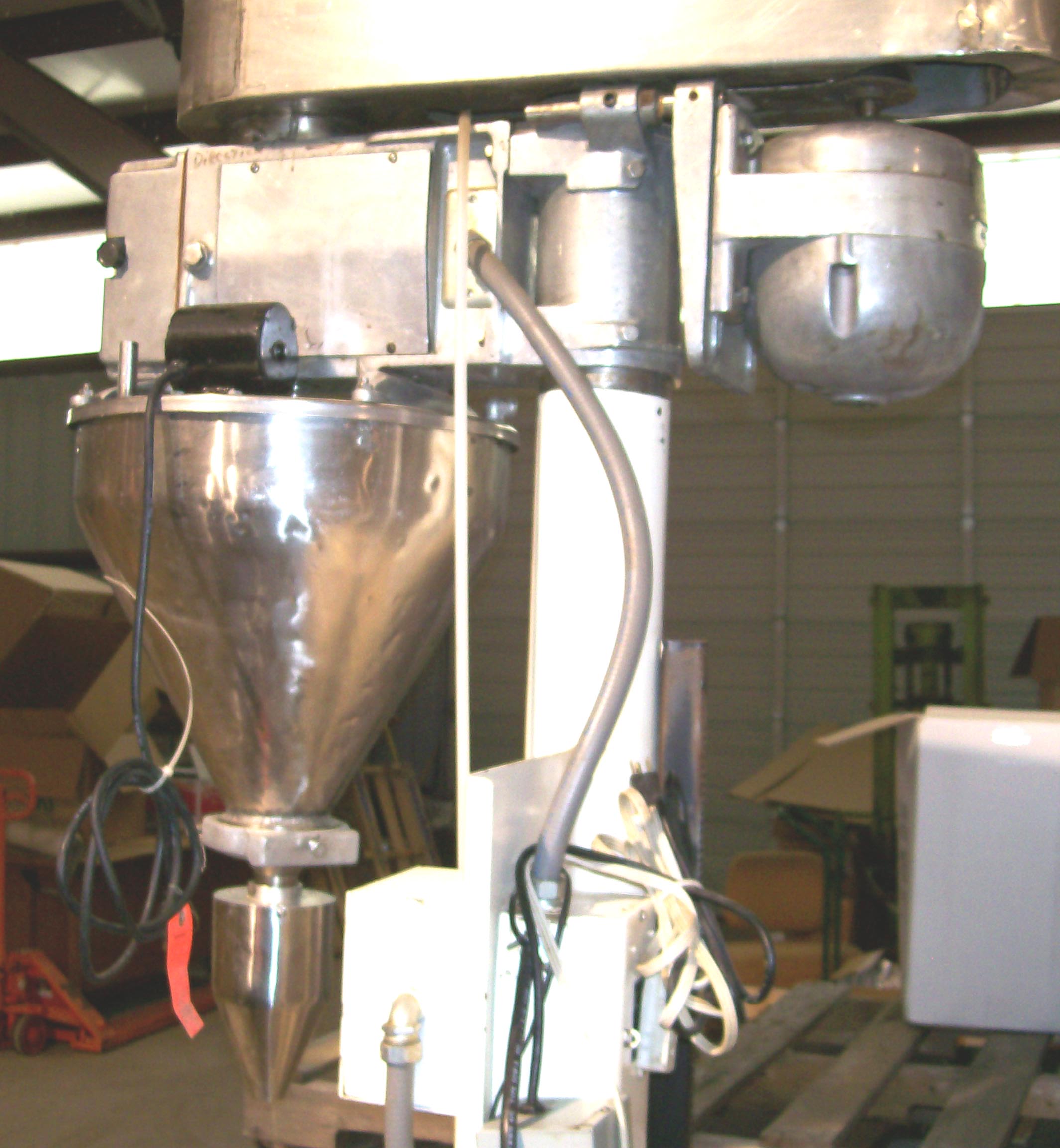 Mateer Model 31-A Auger Filler.  Stainless Steel.  Hopper is approx 5 gallon capacity.  Fitted with industrial vibrator to aid with filling.  0.5 HP, 900 RPM, 220 V.  Filler comes with manual, various gaskets and seals, 1 auger, foot pedal actuator and 2 relays for electronics.  Additional augers can be purchased directly from Mateer-Burt for different flow rates and levels of accuracy.